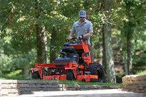 STAND ON MOWERS