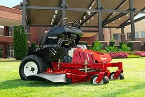 STAND ON MOWERS
